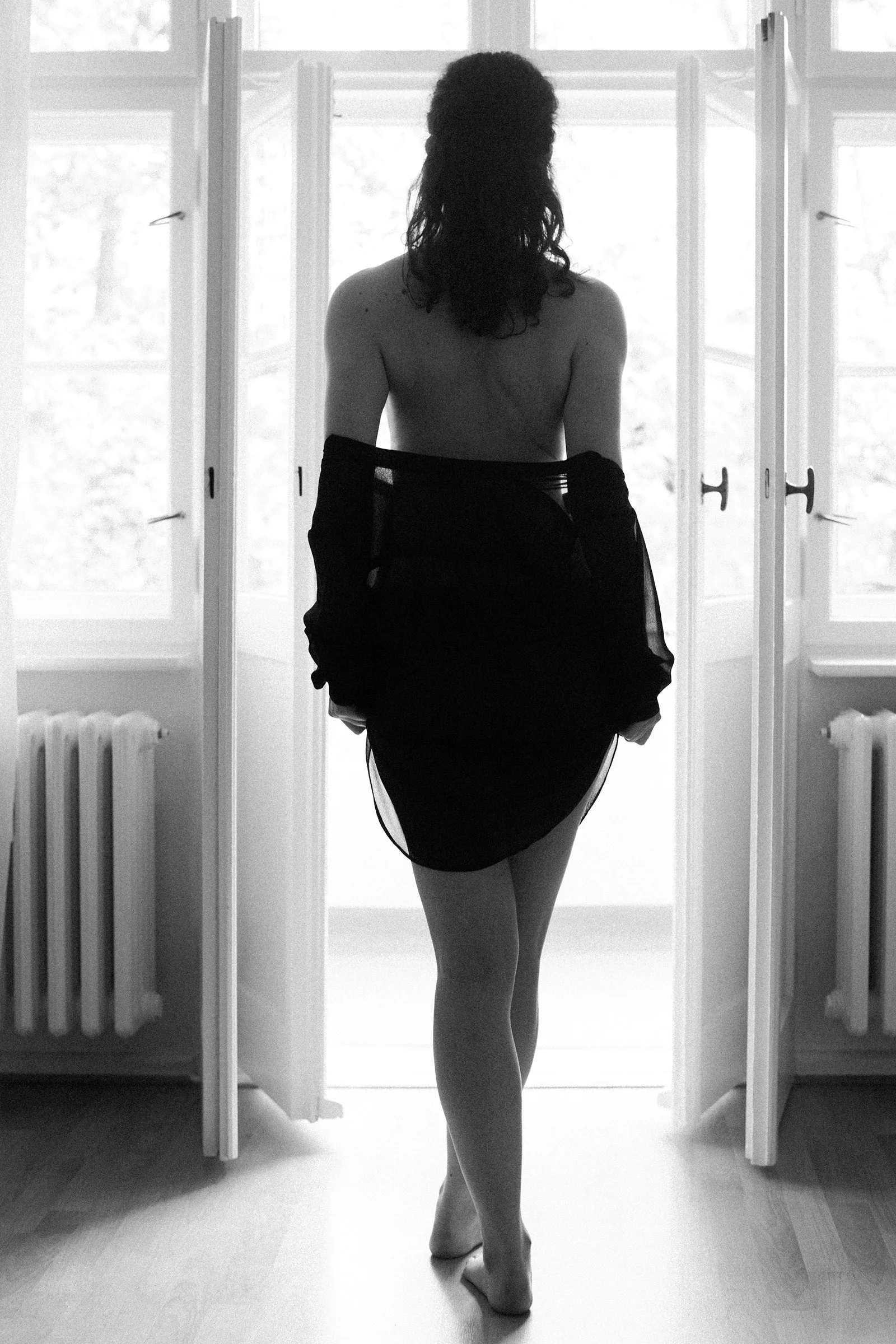 Boudoir Fotoworkshop Frau vor Tür